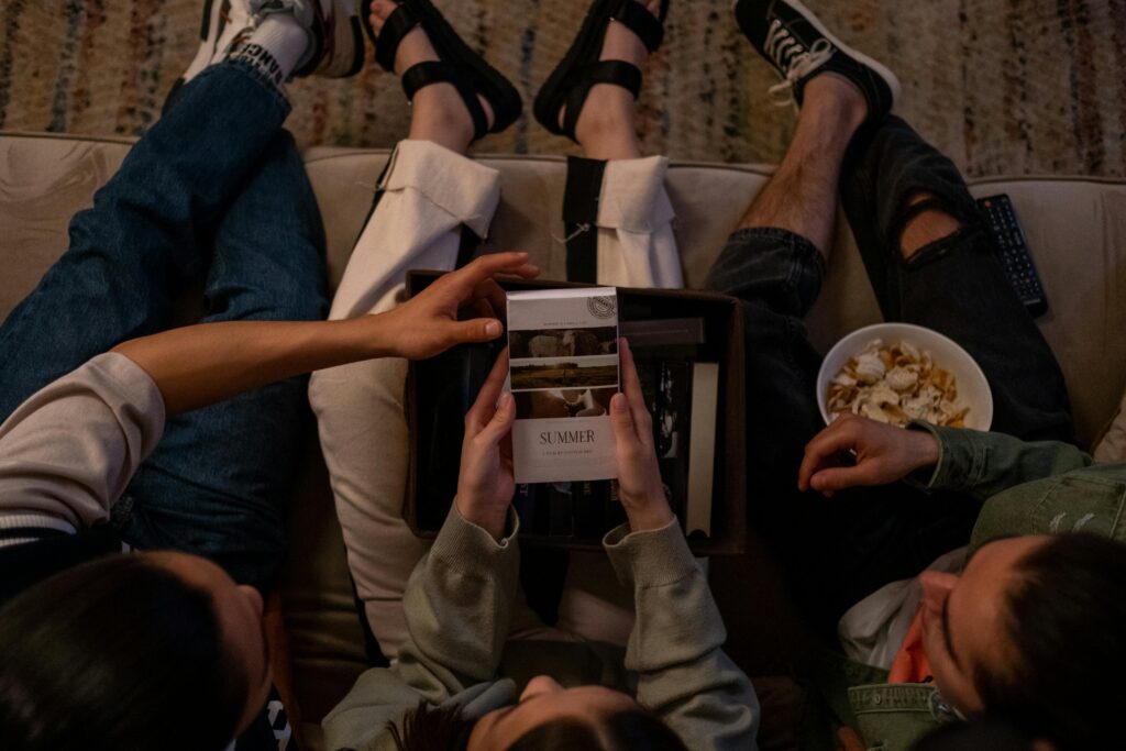 Housemates hanging out on sofa