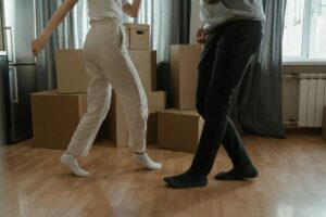 Housemates Dancing whilst Moving into a House Share