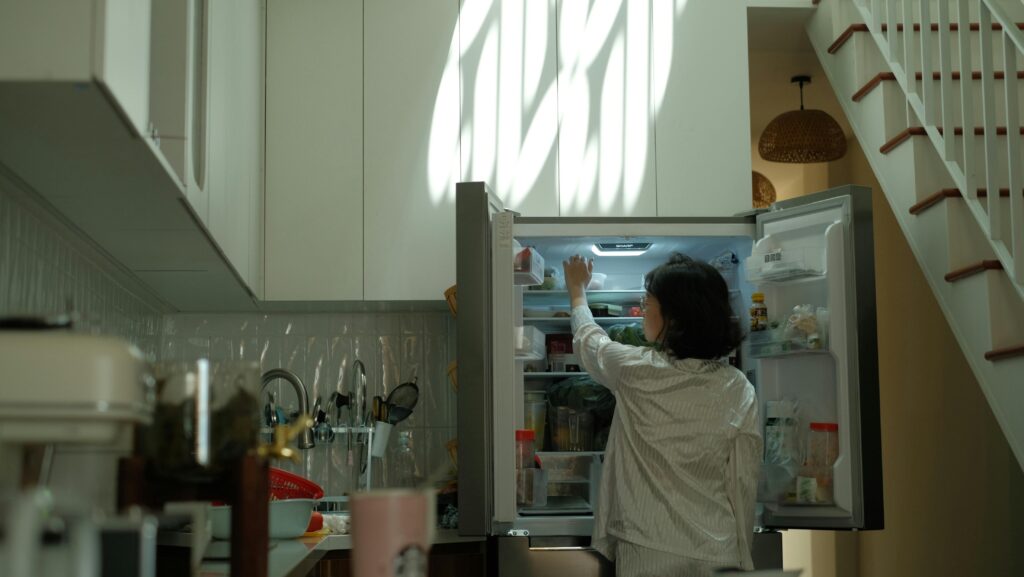 housemate stealing food from fridge
