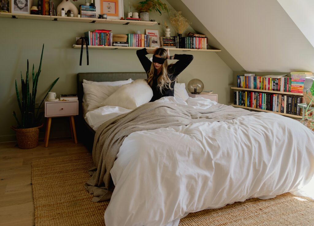 Cozy bedroom with girl in bed providing renter-friendly bedroom ideas